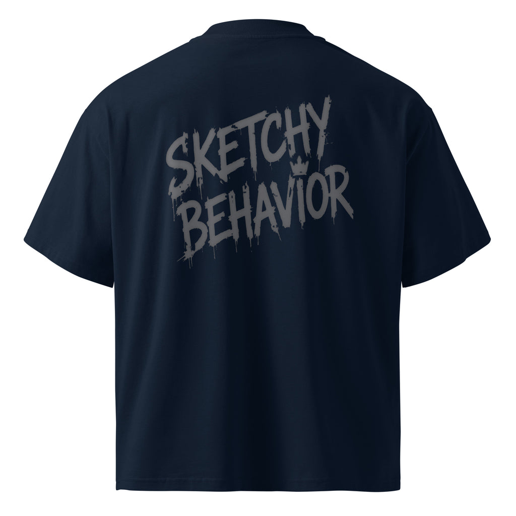Blaster 2.0 unisex organic oversized high-neck t-shirt in French Navy, back view — large black "Sketchy Behavior" spray-style wordmark across the back
