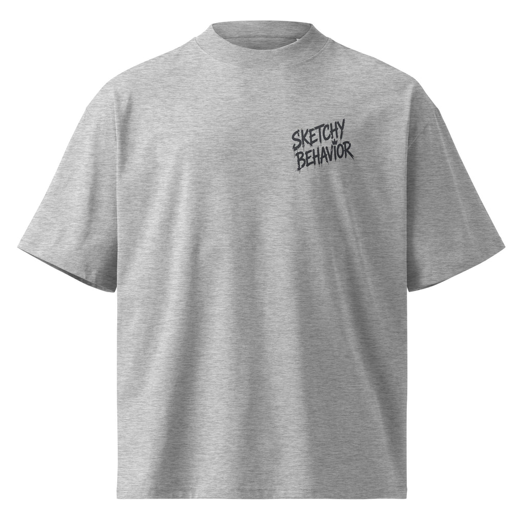 Blaster 2.0 unisex organic oversized high-neck t-shirt in Heather Grey, front view — small black "Sketchy Behavior" spray-style lettering on the left chest