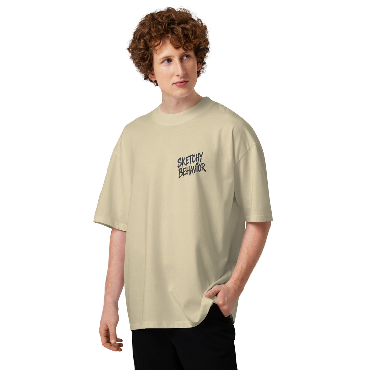 Blaster 2.0 unisex organic oversized high-neck t-shirt in Stone, second front view — small black "Sketchy Behavior" lettering on the left chest